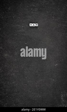 Word ham on black stone background Stock Photo