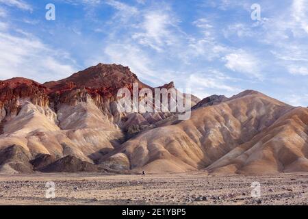 Hikers on the Golden Canyon Trail in Death Valley National Park, California Stock Photo
