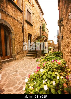 Beautiful alley in Civita di Bagnoregio, Lazio, Italy Stock Photo