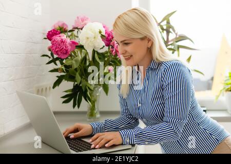 Global communication concept using video conferencing on a laptop Stock Photo