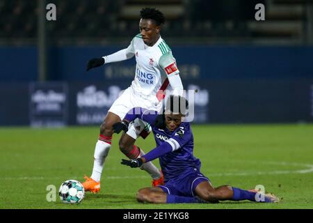 LEUVEN, BELGIUM - JANUARY 10: L-R: Albert Sambi Lokonga of Anderlecht, Kamal Sowah of OH Leuven during the Pro League match between OH Leuven and RSC Stock Photo