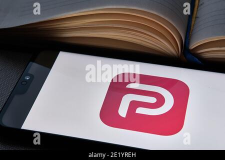 Stafford, United Kingdom - November 10 2020:  Parler app logo seen on the screen of smartphone near the diary. Parler app is a new social media platfo Stock Photo