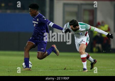 LEUVEN, BELGIUM - JANUARY 10: L-R: Albert Sambi Lokonga of Anderlecht, Xavier Mercier of OH Leuven during the Pro League match between OH Leuven and R Stock Photo