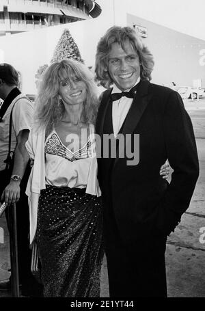 JEFF CONAWAY with wife Rona Newton-John at the US Magazine Party Credit: Ralph Dominguez/MediaPunch Stock Photo