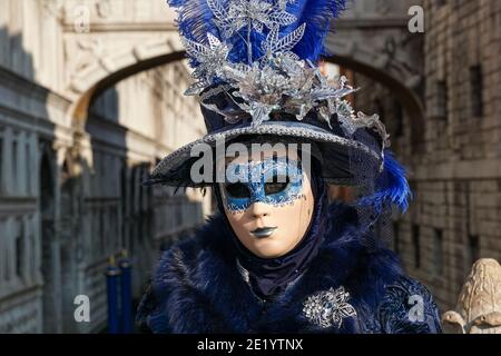 Women in Masks and Costumes with Bridge of Sighs Behind, at Venice