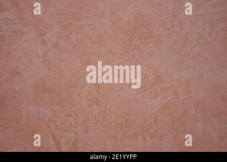 ochre colored stucco background with abstract drawings Stock Photo