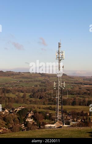 Phone mast in the Peak District National Park above the Derbyshire village of Ashford in the Water Stock Photo