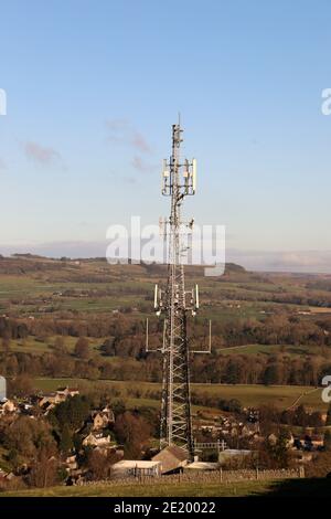 Phone mast in the Peak District National Park above the Derbyshire village of Ashford in the Water Stock Photo