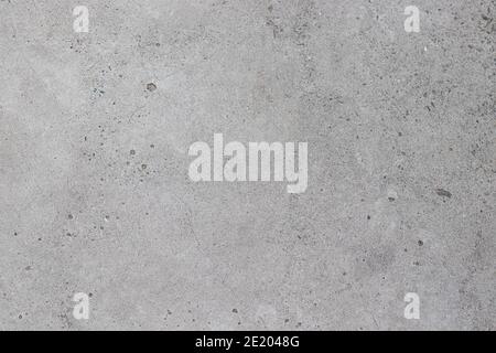 Concrete gray texture with small dots and cracks. Copy space for graphic design Stock Photo