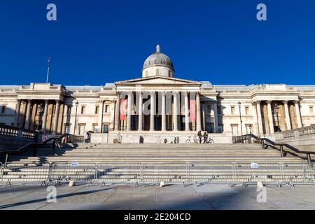 9th January 2021 - London, UK, Staircase barred with metal blockades in front of the National Gallery during the 3rd coronavirus pandemic lockdown Stock Photo