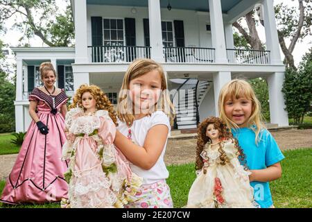 Alabama Mobile Oakleigh Historic Complex 1833 Greek Revival Mansion,woman female guide period dress outfit girl girls children dolls, Stock Photo