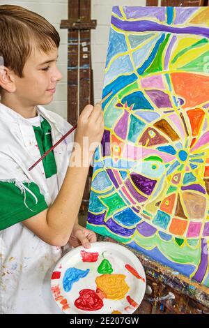 Alabama Fairhope Eastern Shore Art Center centre,community gallery class boy artist painting easel, Stock Photo