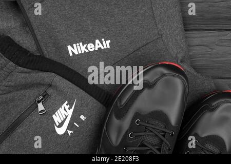 KHARKOV, UKRAINE - DECEMBER 20, 2020 Nike air logo on grey sports wear  fragment. Nike is American multinational corporation engaged in  manufacturing and worldwide marketing of clothes and footwear 31232502  Stock Photo at Vecteezy