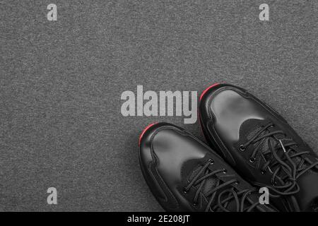 KHARKOV, UKRAINE - DECEMBER 20, 2020: Nike brandy dark grey shoes. Nike is American multinational corporation engaged in manufacturing and worldwide m Stock Photo