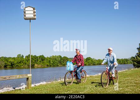 Alabama Monroeville Isaac Creek Campground,Claiborne Lake Alabama River Lakes man woman female couple,bicycling riding bicycles biking birdhouse, Stock Photo