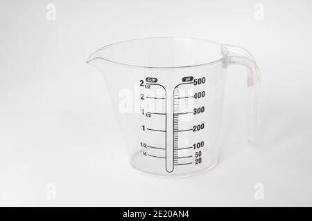 measuring cup isolated on white background. Stock Photo