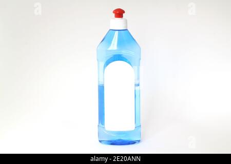plastic transparent bottle with liquid soap in blue for cleanliness with red cap Stock Photo