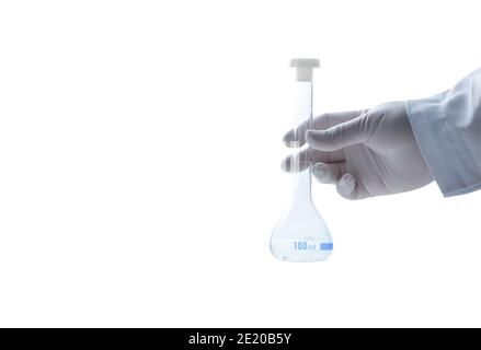hand scientist wearing rubber gloves and hold 100 ml. Erlenmeyer flasks isolated on white background and coppy space, Chemical laboratory glassware an Stock Photo