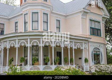 Detail of porch on American Victorian Italianate style clapboard house ...