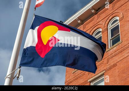 Colorado Flag in front of the building in Central City, Colorado Stock Photo