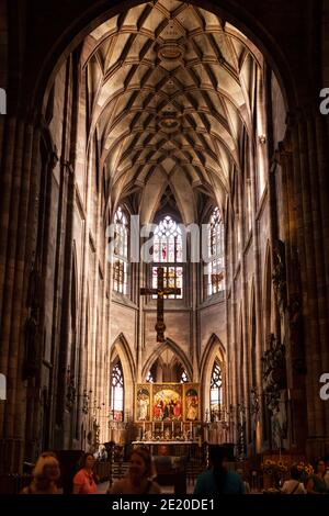 The interior and altar of the historic gothic minster (cathedral) in Freiburg im Breisgau, Germany. Stock Photo