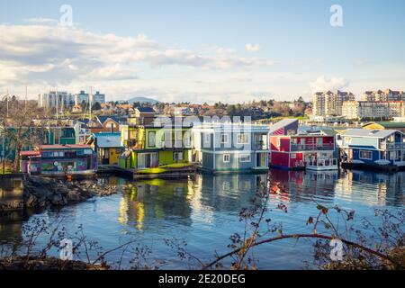 Quaint, floating houseboats in Fisherman's Wharf in Victoria, British Columbia, Canada. Stock Photo