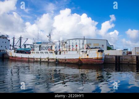 A Chinese fishing vessel at the dock in Colonia, Yap, Micronesia. Stock Photo