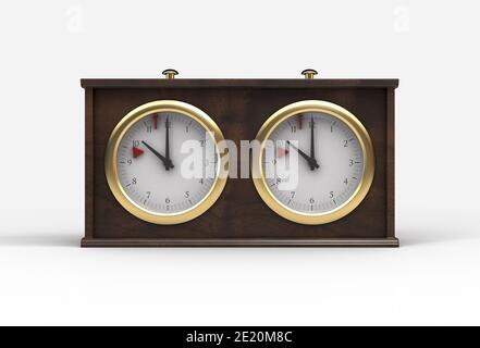 A classic wooden analog chess clock with brass trimmings on an isolated white studio background Stock Photo