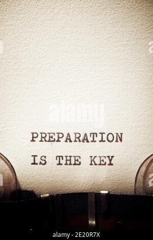 Preparation is the key phrase written with a typewriter. Stock Photo