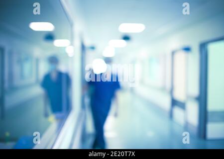 Medical worker in the hospital hall, unfocused background. Stock Photo