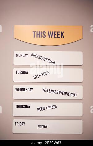 Weekly Planner In Creative Office With Motivational Activities For The Week Stock Photo