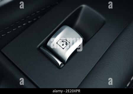 Window lifter button in a luxury car Stock Photo