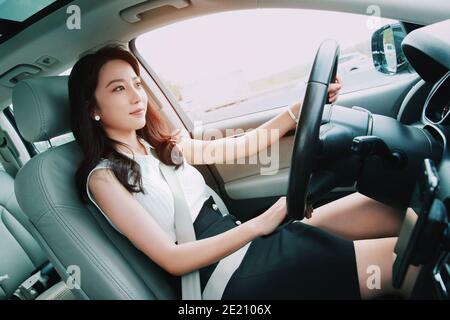 Fashion confident young women to drive Stock Photo