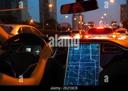 Displaying a map on the screen when driving a car Stock Photo