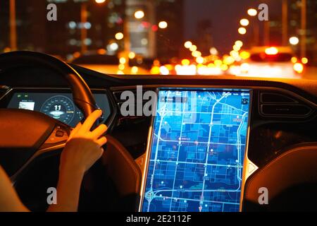 Displaying a map on the screen when driving a car Stock Photo