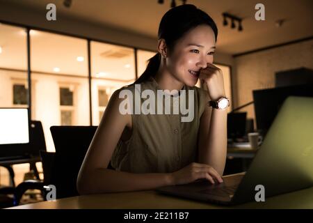 Business lady in the office to work overtime Stock Photo