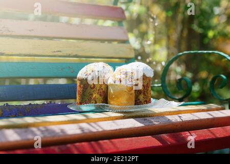 Three easter cakes in the nature against a background of a green spring grass Stock Photo