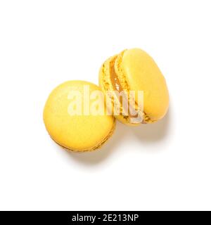 Lemon flavor macarons top view isolated on white background Stock Photo