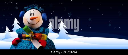 Snowman in the snow against starry night sky concept with copy space ...
