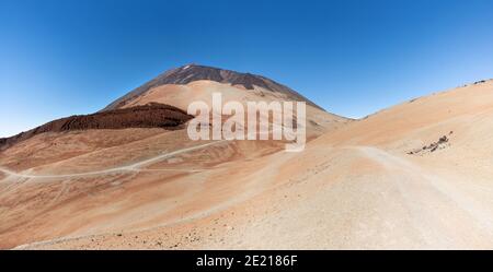 Hiking trail in the desert landscape at Teide volcano on Tenerife island Stock Photo