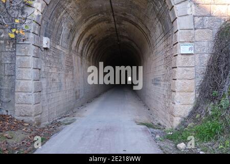 train abandoned tunnel illuminated in Olvera Stock Photo