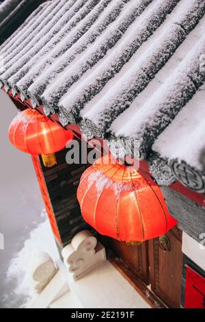 Chinese courtyard door hang red lanterns Stock Photo