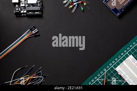 Overhead Flat Lay Shot Of Electronic Computer Components On Black Background Stock Photo