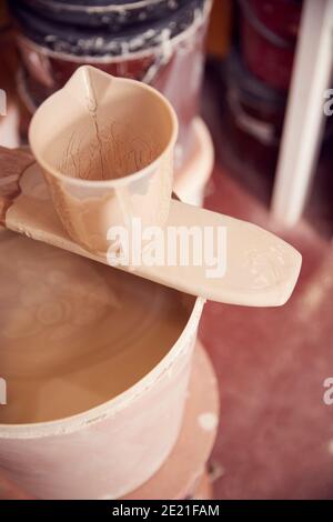 Close Up Of Mixture For Glazing Pots In Ceramics Studio Stock Photo