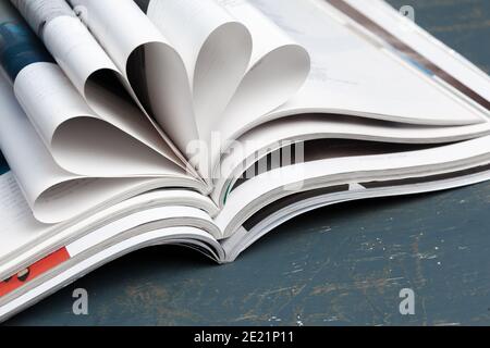 Close up stacking magazine place on table background Stock Photo