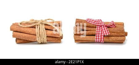 dry cinnamon sticks tied with red ribbon, spice isolated on white background, set Stock Photo