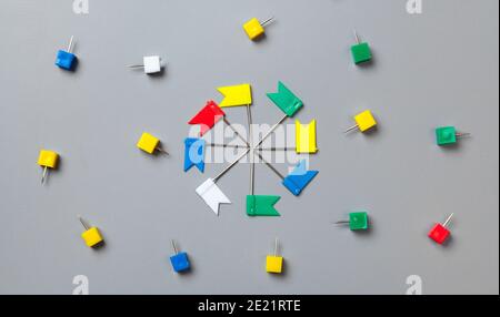 Colorful push pins isolate on gray background Stock Photo