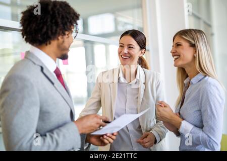 Portrait of successful business people working together in office Stock Photo