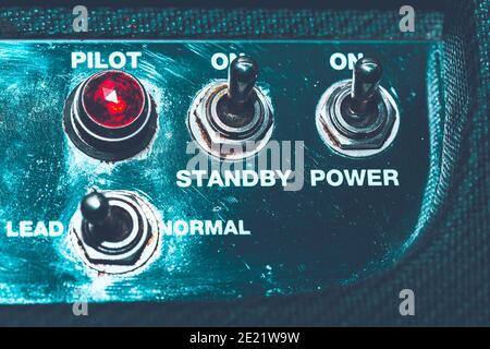 Guitar Combo Toggle Switches . Guitar Amplifier Gain channel contour control Stock Photo