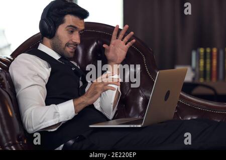 Making global connections, business man having video Conference Stock Photo